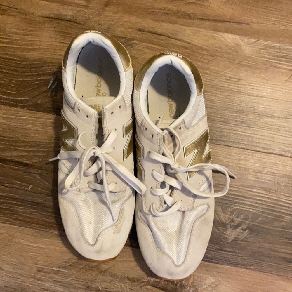 New Balance tennis shoes.